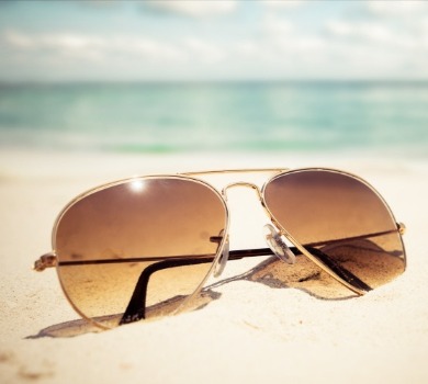 sunglasses on the beach | SeaShore Realty