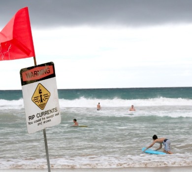 rip current sign on the beach | SeaShore Realty