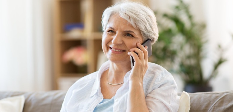 woman talking on cell phone | SeaShore Realty