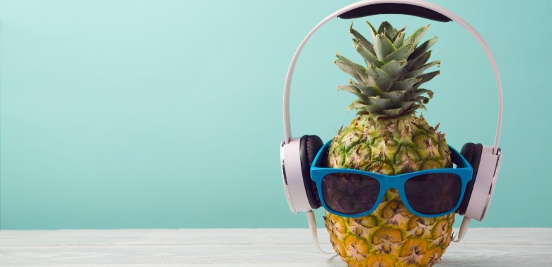 pineapple with headphones | SeaShore Realty