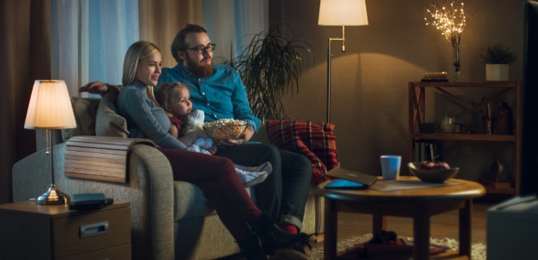 family watching movie together | SeaShore Realty