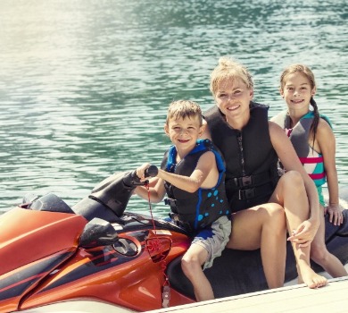 family jet skiing in topsail island, nc | Seashore Realty