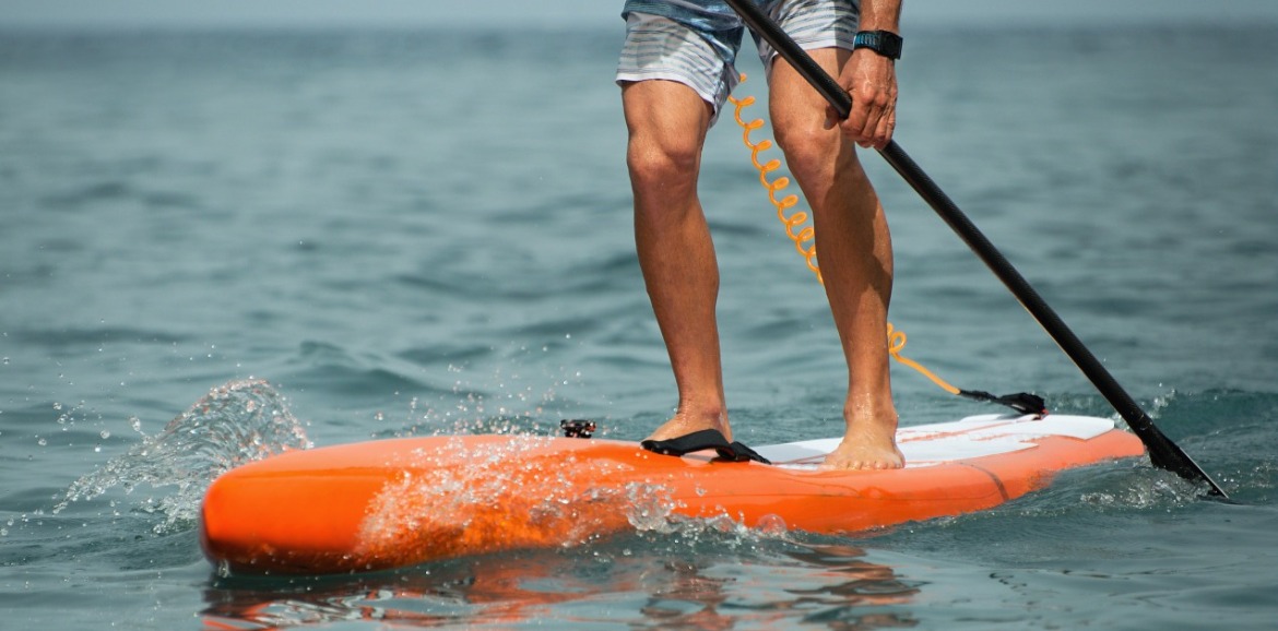 paddle boarding on topsail island | Seashore Realty Group