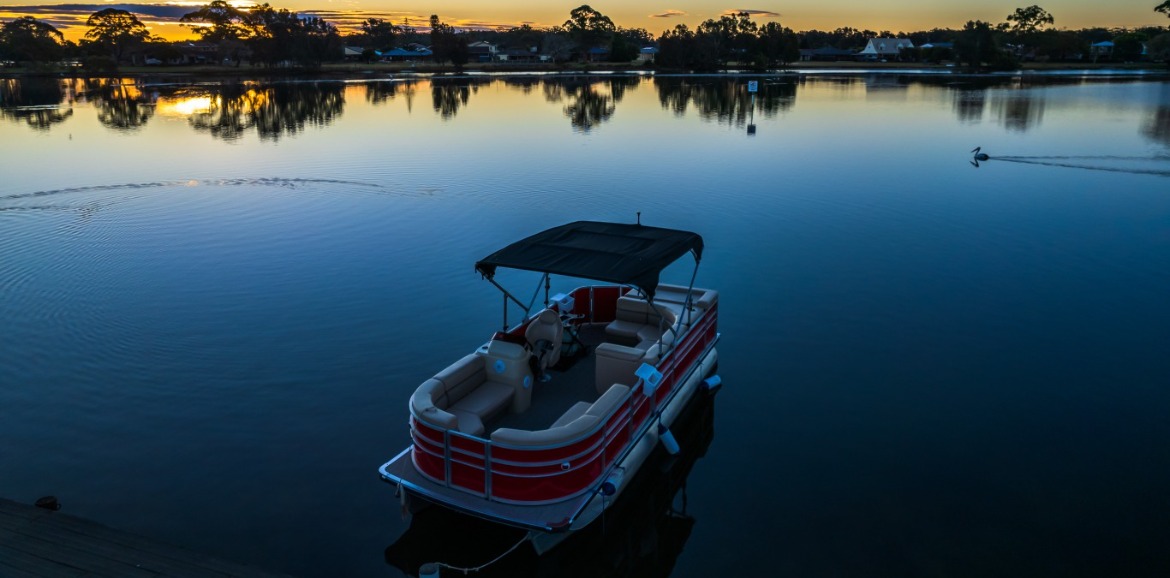 pontoon boat on the water | seashore realty