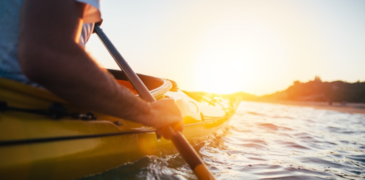 person kayaking | seashore realty