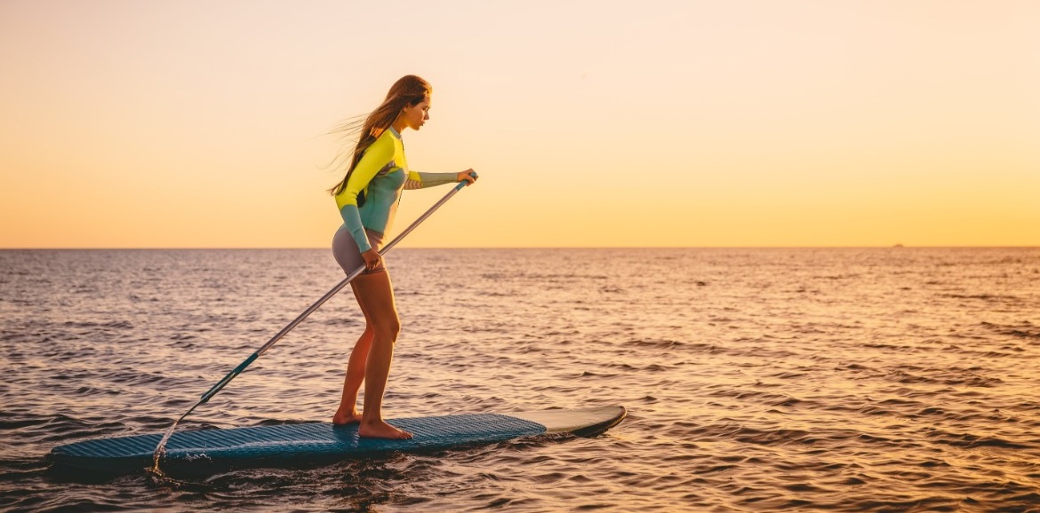 paddle boarding on topsail beach | SeaShore Realty